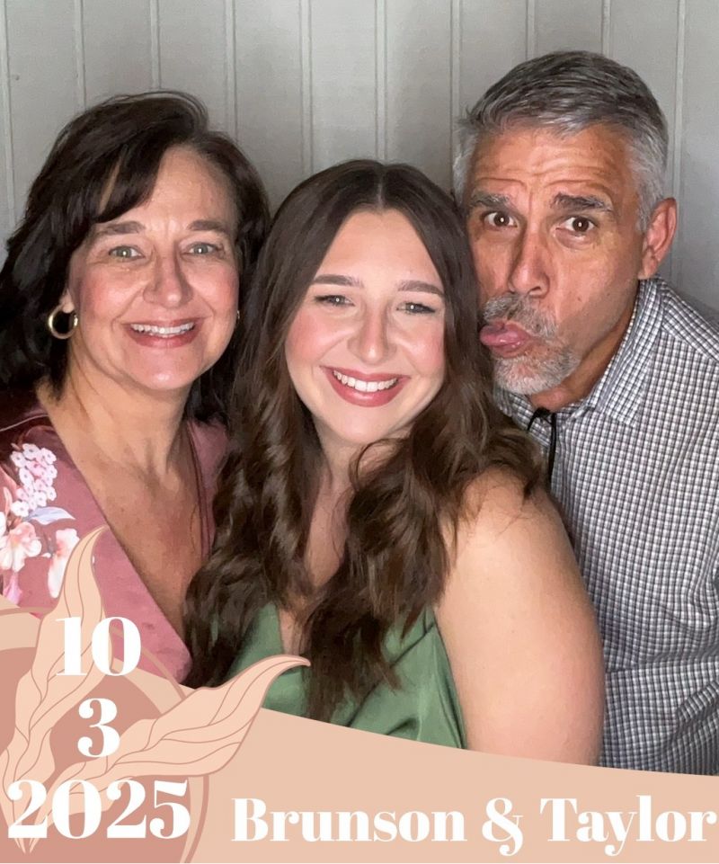 Me with my beauties (Julie and Reese) at a fall wedding.  I thought they said "funny face picture"!  Oops